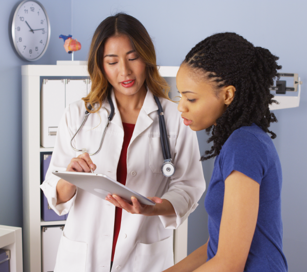 Picture of a female doctor reviewing results with a patient in a clinic